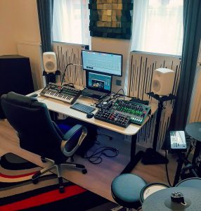 Adam's home studio, using acoustic panels.